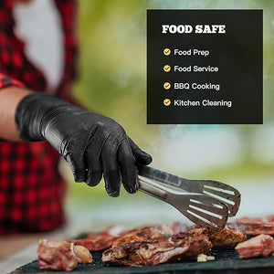 Person grilling with black gloves and tongs, with a focus on food safety.