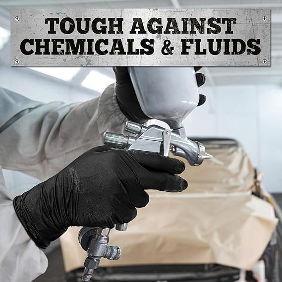 Person wearing black gloves using a spray gun