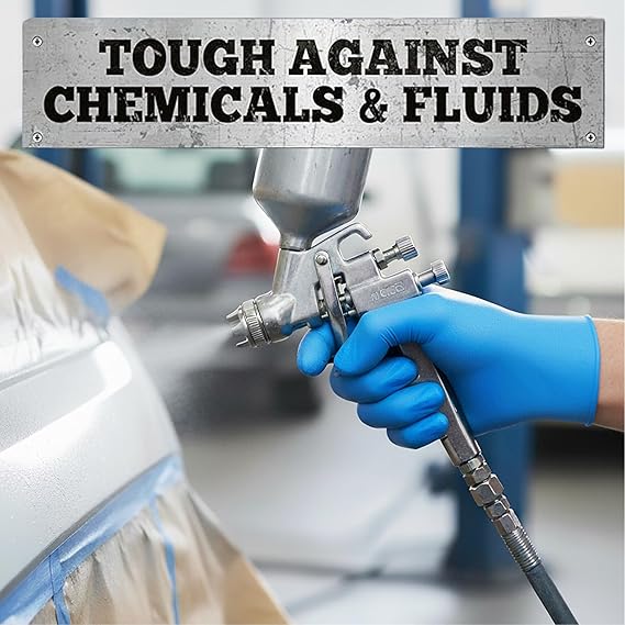 Person wearing blue gloves holding a spray gun with text 'Tough Against Chemicals & Fluids' above.